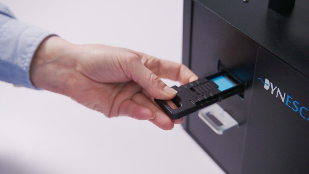 Insert the sample on the slide tray